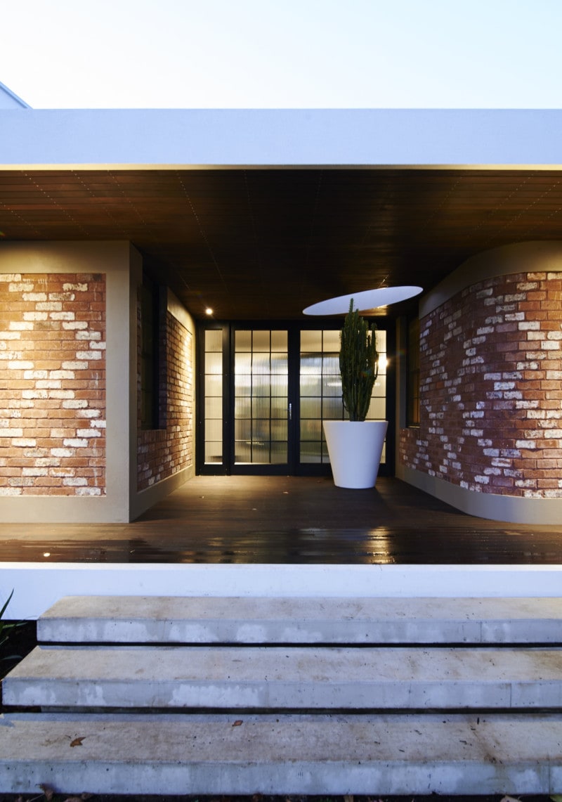 Luigi Rosselli, Recycled Brick Wall, Thin Steel Attic Windows, Patterned Brick, curved recycled brick wall ribbed glass steel doors entry