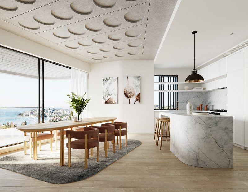 a simple yet elegant kitchen and dining layout. Carrara kitchen island, white veneered kitchen joinery, concrete ceiling with recessed looking onto the terrace