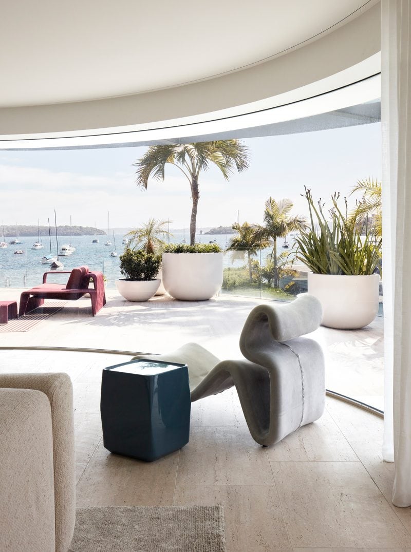 Luigi Rosselli, the living room's curved glass window slides open offering a panoramic view of the harbor